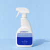A white 750ml trigger spray bottle of protectME Premium Fabric Protector, set against a solid light blue background.
