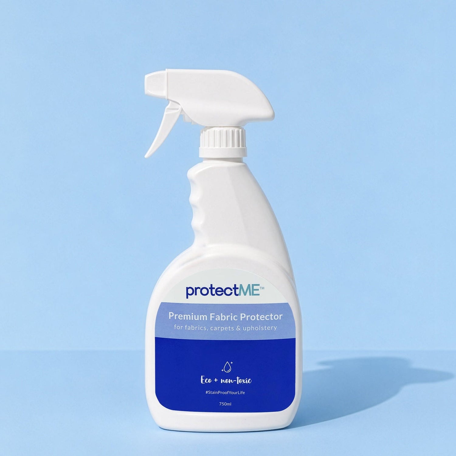 A white 750ml trigger spray bottle of protectME Premium Fabric Protector, set against a solid light blue background.
