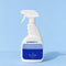 A white 750ml trigger spray bottle of protectME Premium Fabric Protector, set against a solid light blue background.