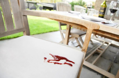 stain of tomato sauce on white chair